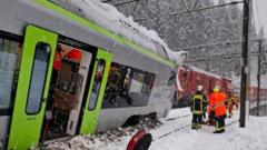 Five injured as Swiss train derails in heavy snow