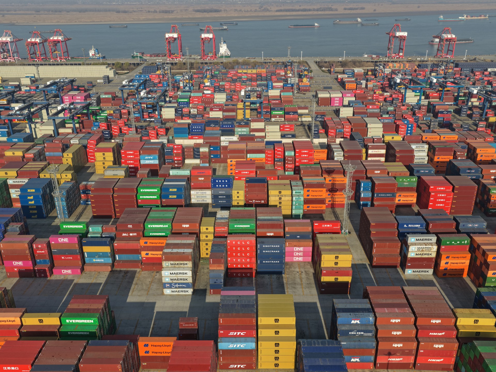 US trade deficit swells in December as imports surge