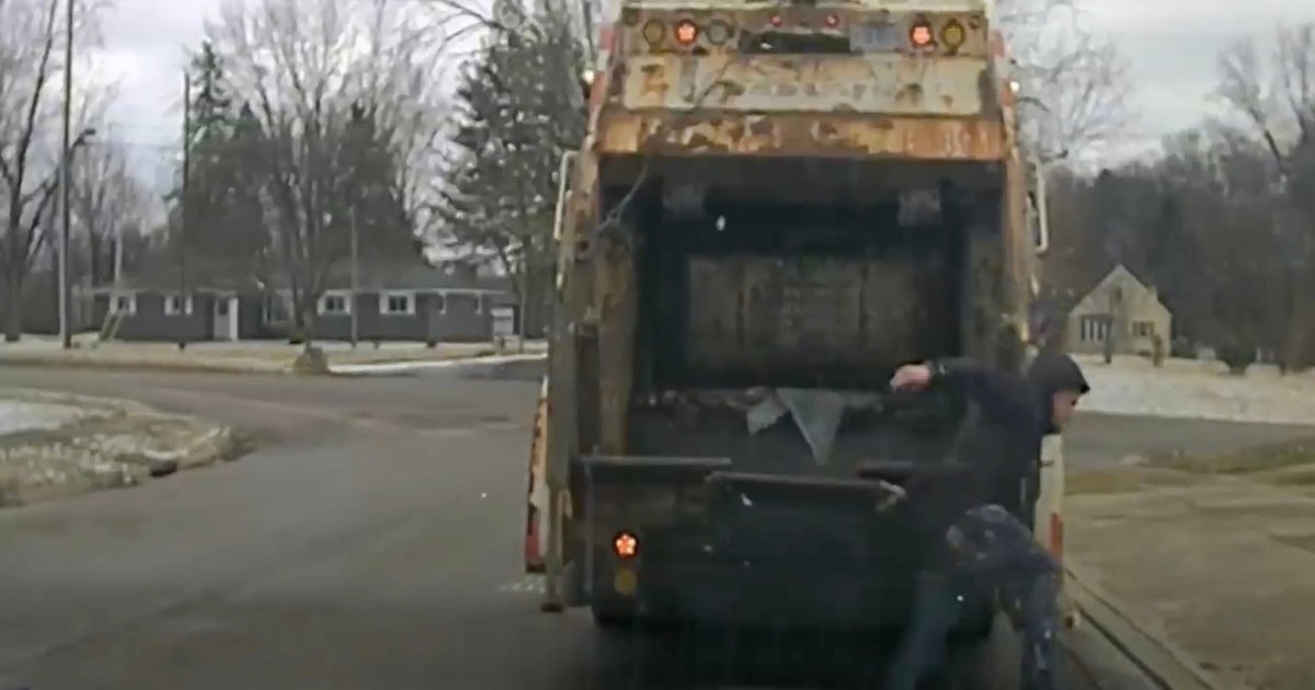 Ohio Sanitation Worker Finds Police Suspect Hiding In Trash Can