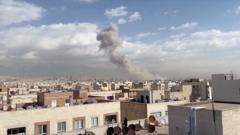 Watch: Smoke rises over Tehran as Trump ‘seeks regime change’