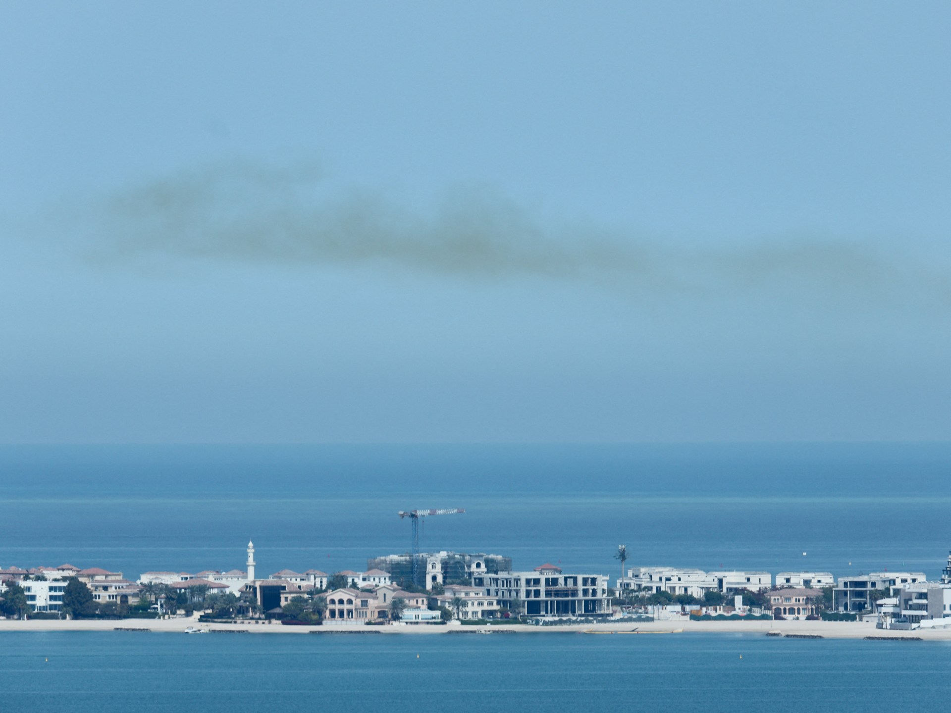 Missile debris injures eight in Qatar after Iran launches barrage