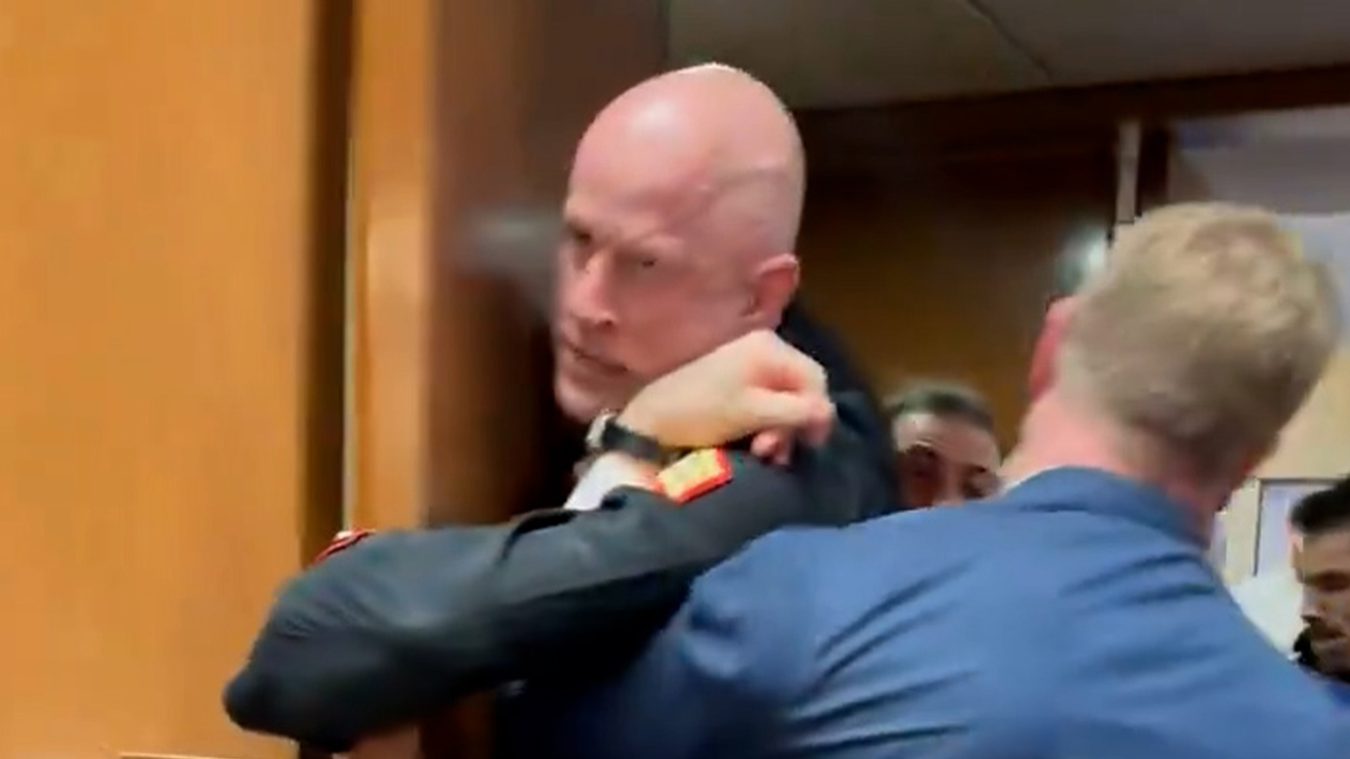 US Senator helps police drag anti-war protester from meeting