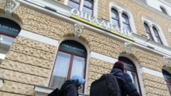Hungary confirms it is holding seven Ukrainian bank workers and $80m
