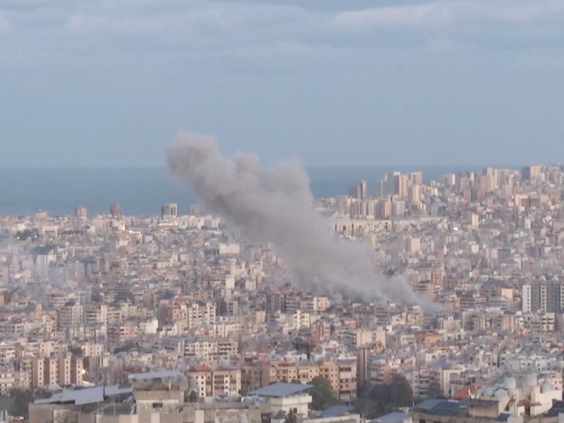 Smoke rises over Beirut after Israeli strike on Raouche building