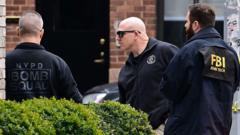 Two men charged with terror offences after homemade bomb thrown outside NYC mayor’s home