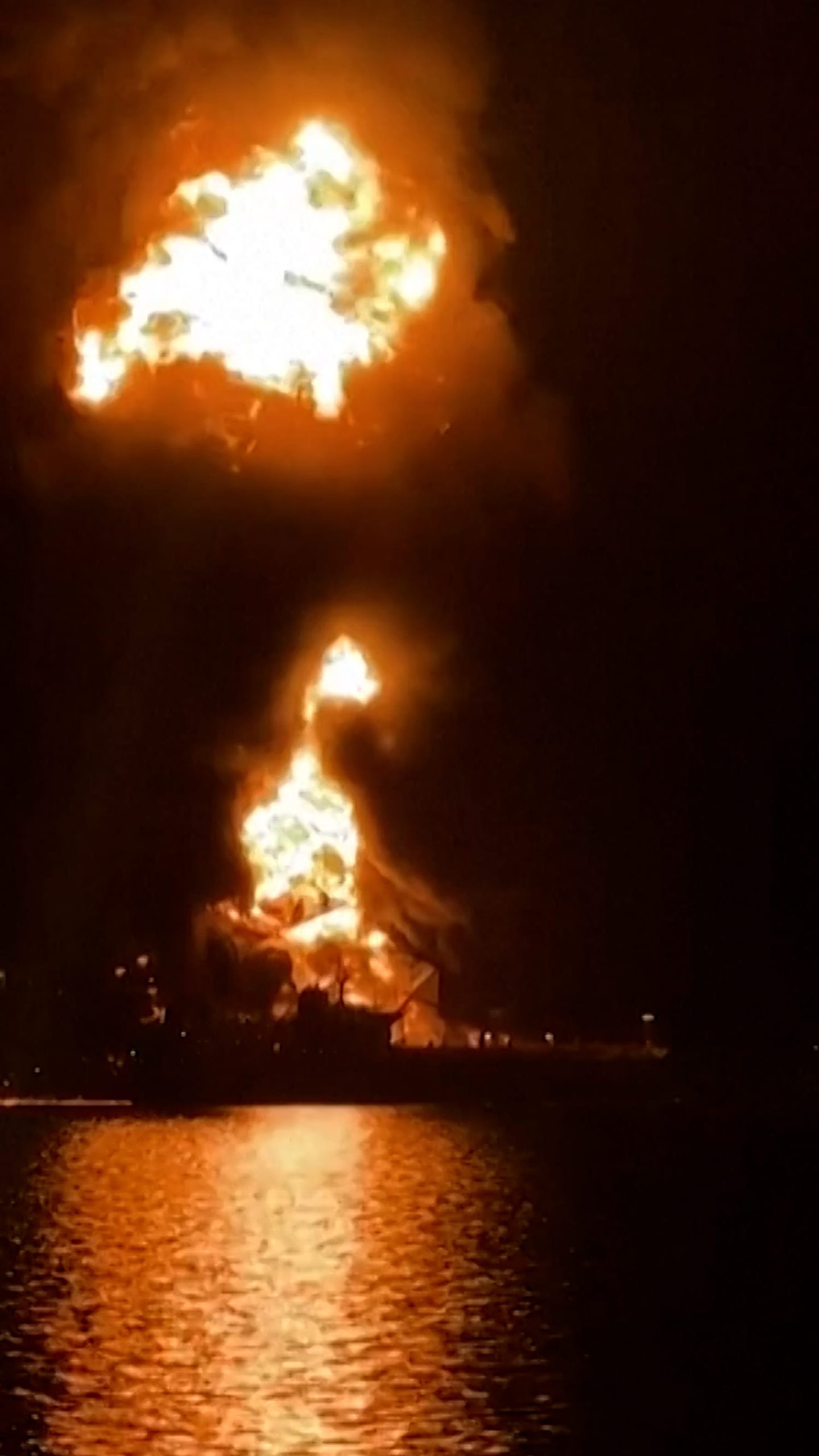 Two fuel tankers caught fire after strikes in Iraqi waters