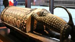 France returns sacred ‘talking drum’ looted during colonial rule to Ivory Coast