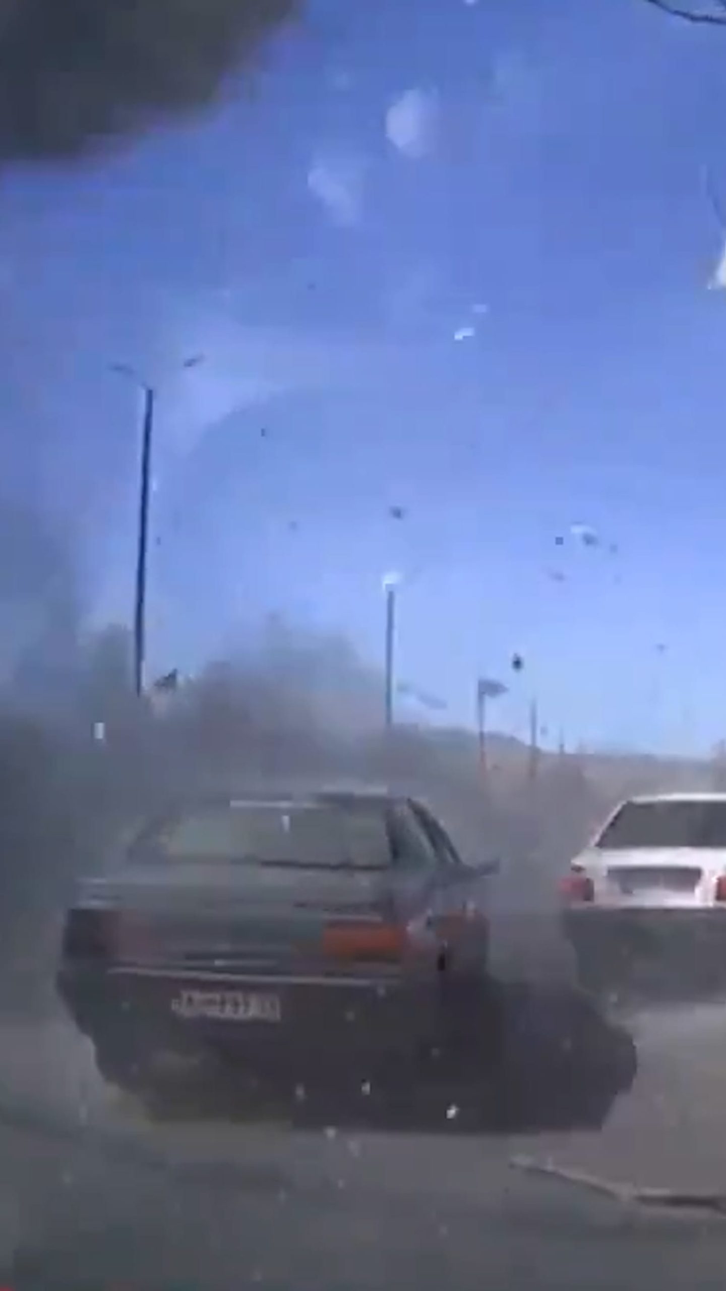 Video shows missiles striking an Iranian neighborhood