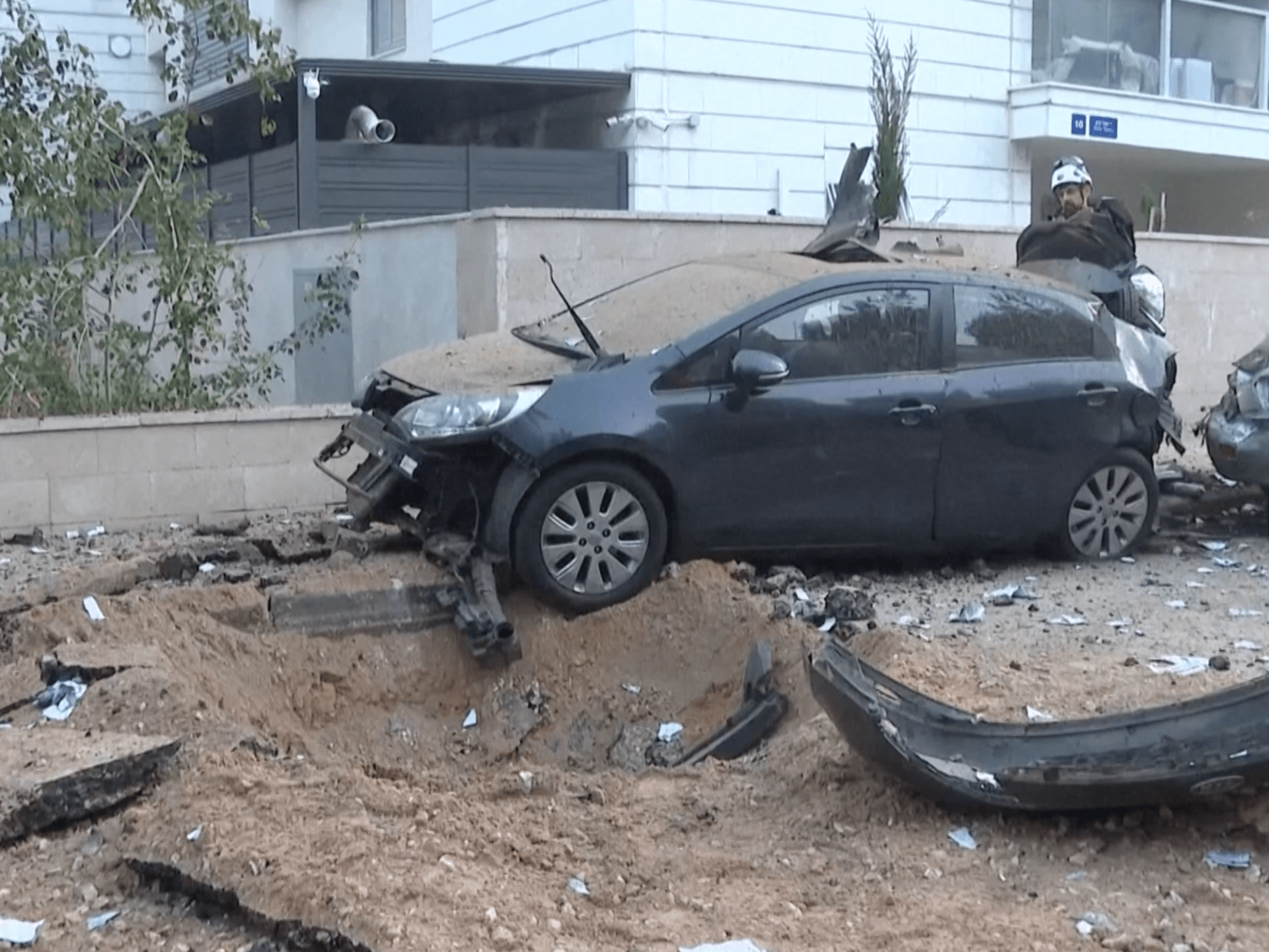 Aftermath of Iranian ‘revenge’ strikes on Israel leaves destruction, two ki