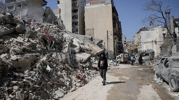 Israeli airstrikes in Beirut intensify, demolishing a 10-storey building and striking bridges