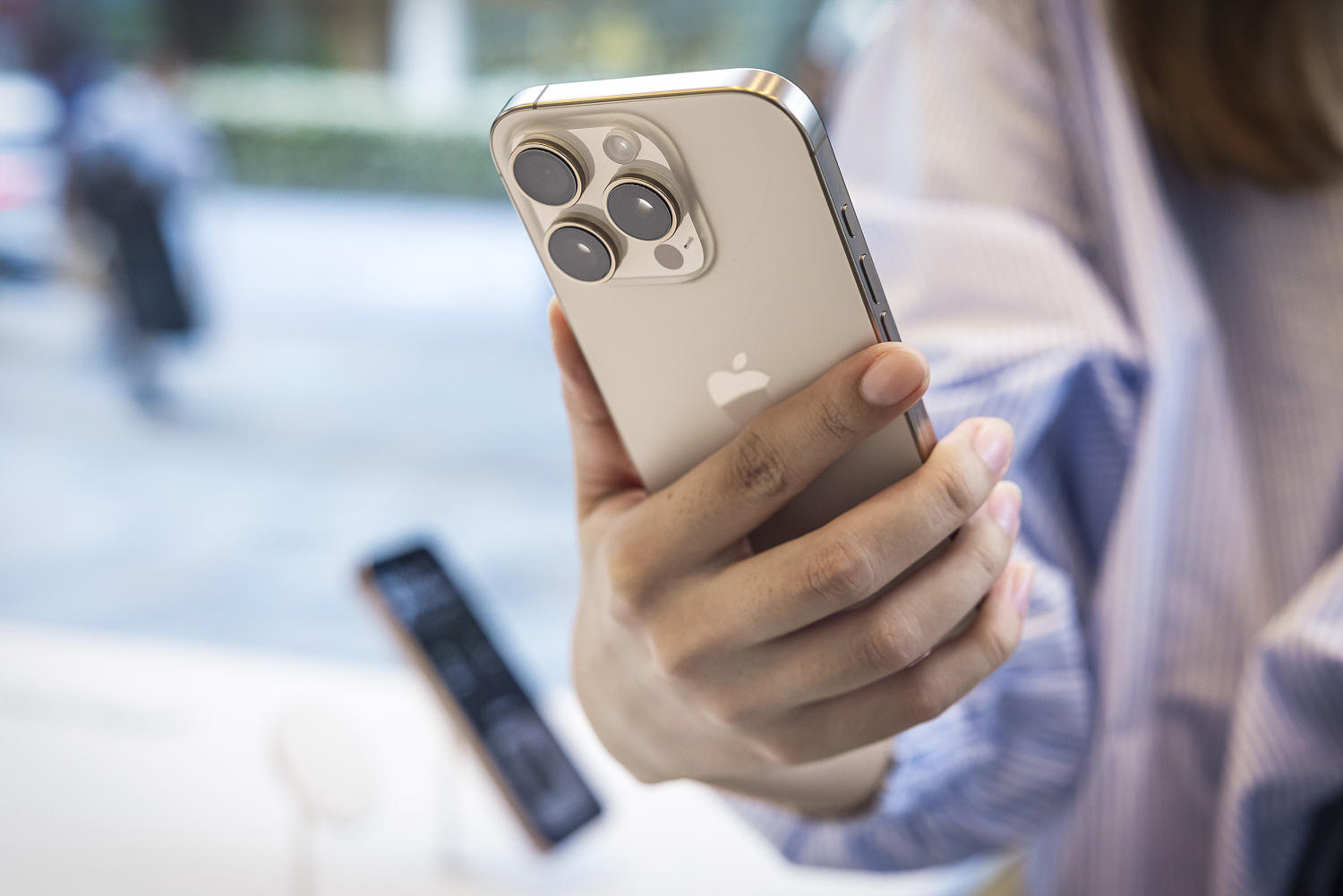 Apple warns iPhone users to update software after mass hacking campaigns