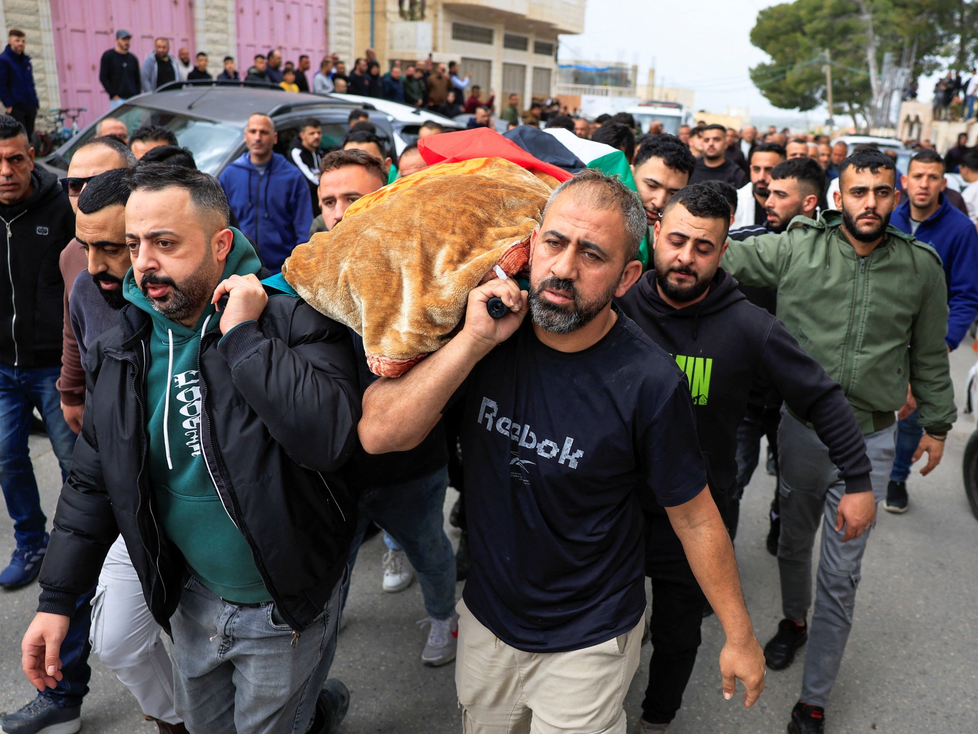 Palestinians bury four women killed in Iranian missile attack