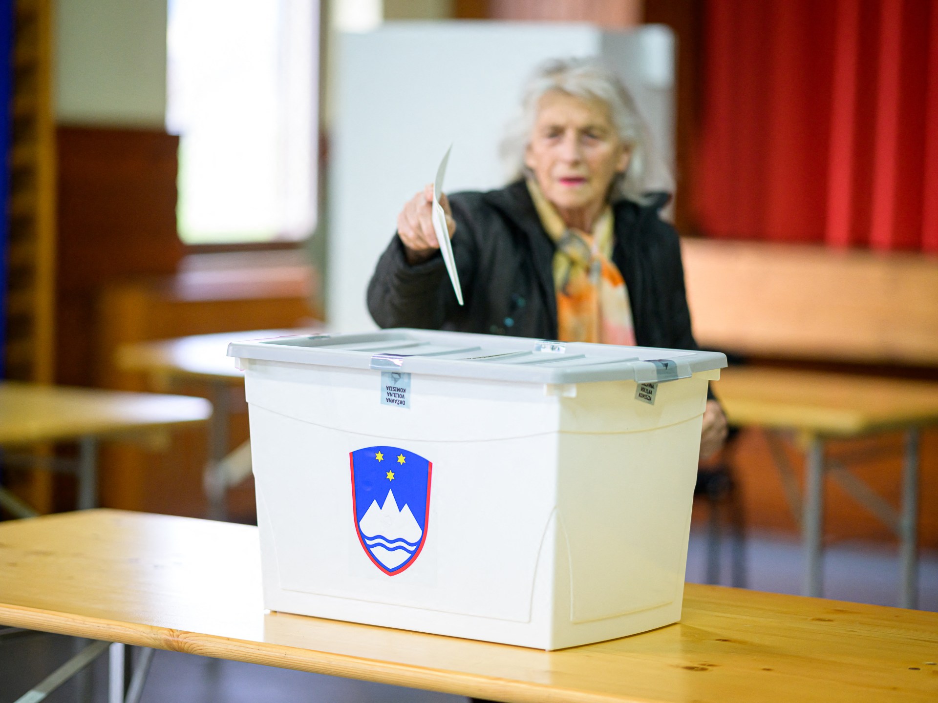 Slovenia’s governing liberals face right-wing populists in tight election