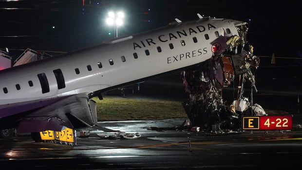 2 pilots killed after Air Canada plane collides with vehicle at New York’s LaGuardia Airport