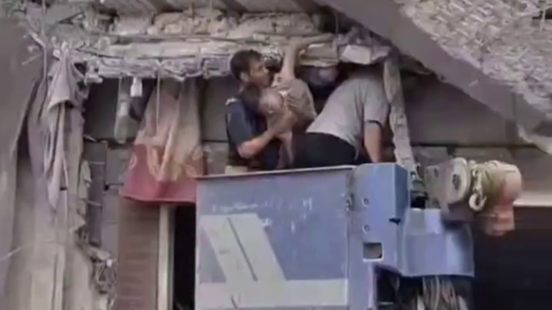 Rescue workers rush to save lives after south Tehran missile strike