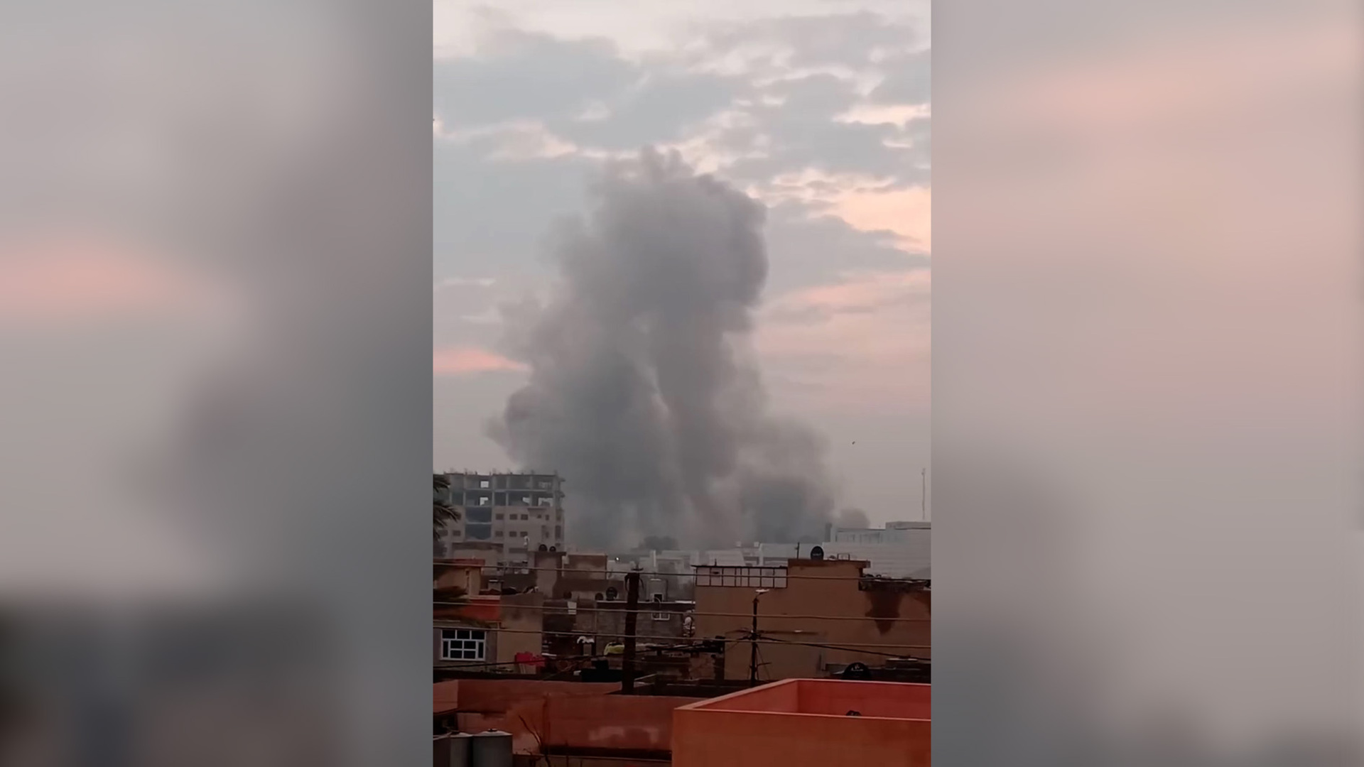 Thick plumes of smoke rise over Iraq’s Mosul after strikes