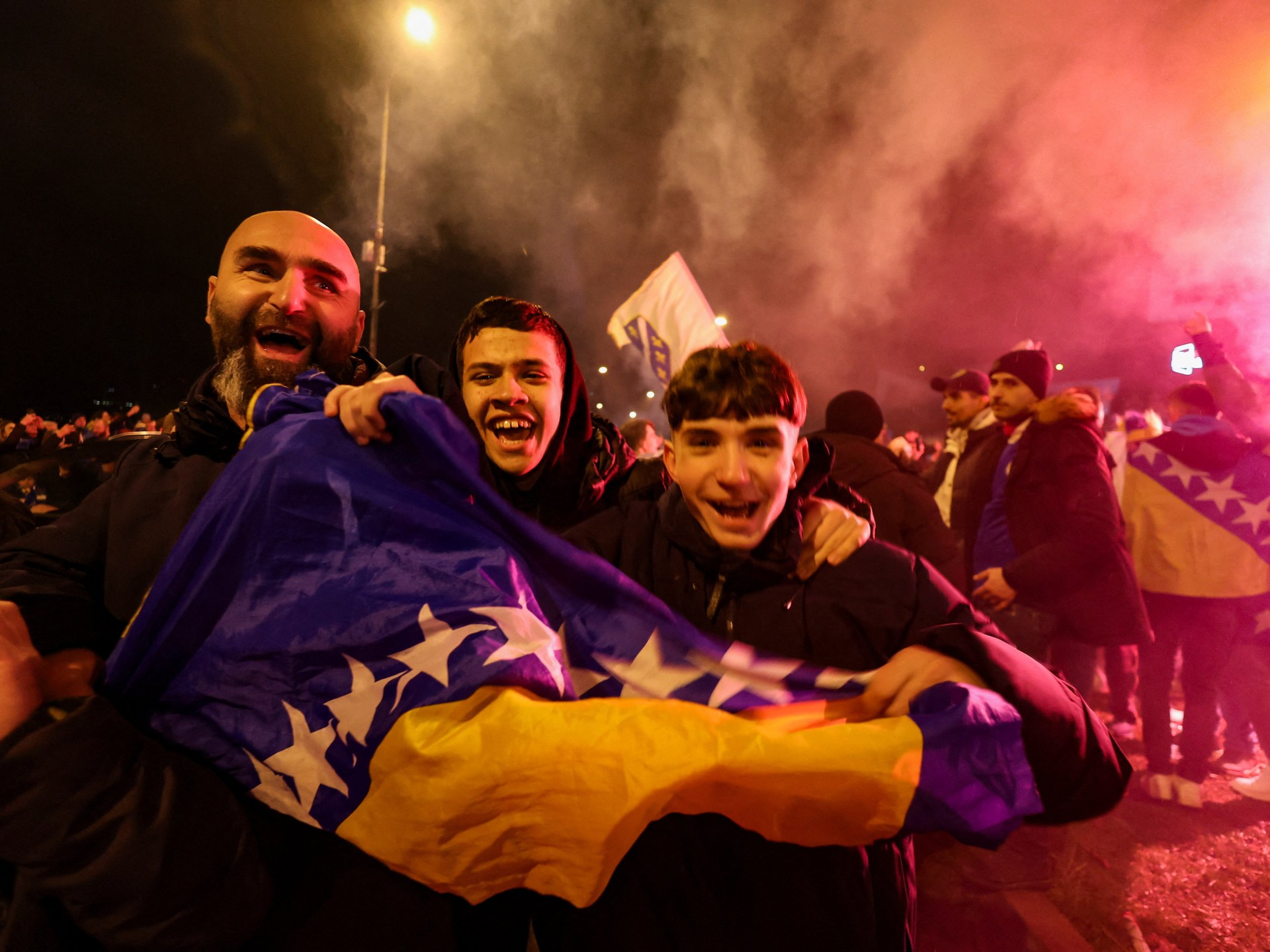 Bosnia fans celebrate as team qualifies for World Cup, knocking Italy out