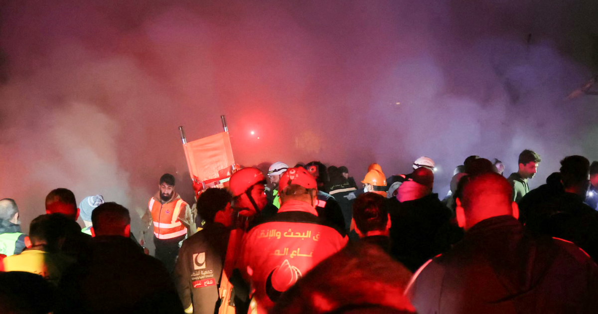 Emergency workers search for victims of Israeli airstrikes on Beirut