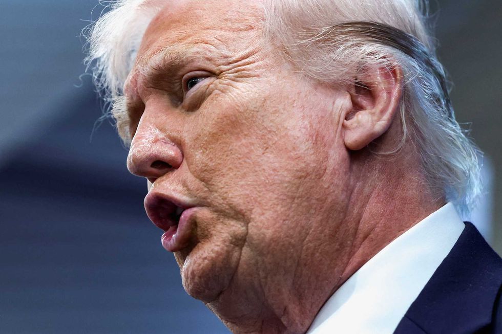 ‘Give it up or go to jail’: Trump issues open threat to journalist at White House event