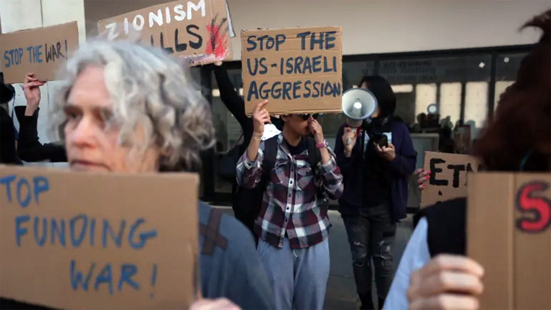 Protesters swarm US embassy in Tel Aviv, demanding end of wars