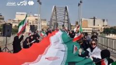 Iranians form human chains at bridges and power plants