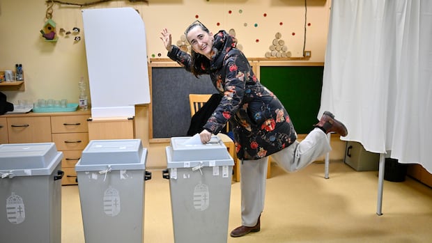 Hungarians vote in landmark election that could unseat Orbán