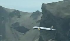 Houses shake as pilot flies 300ft above home village to celebrate retirement