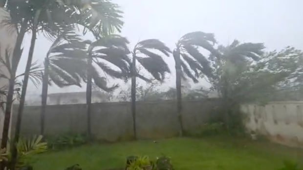Super Typhoon Sinlaku batters remote U.S. islands with ferocious winds