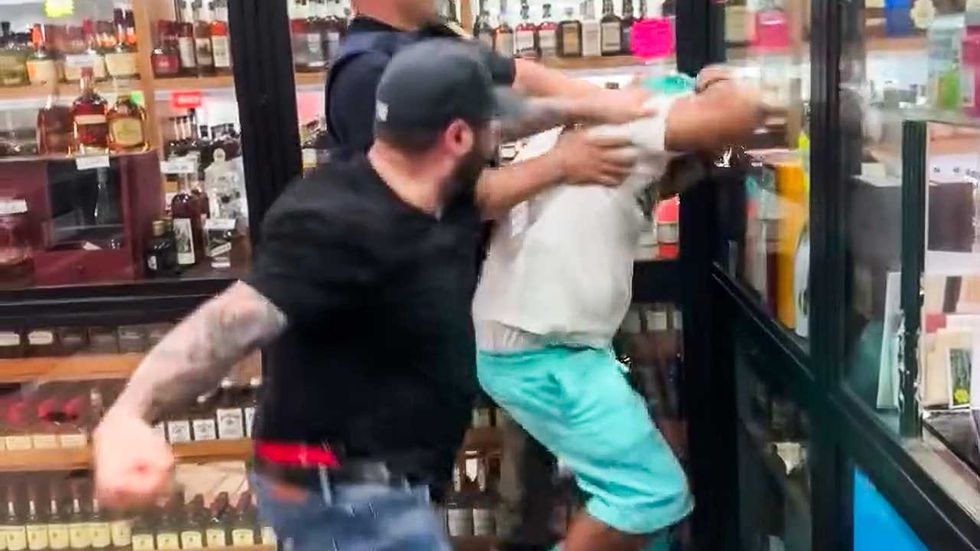 ‘Extremely disturbing’: Outrage as white narcotics officers beat Black man in liquor store