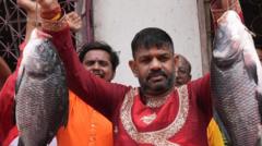 Indian politicians are campaigning while holding fish. What is going on?
