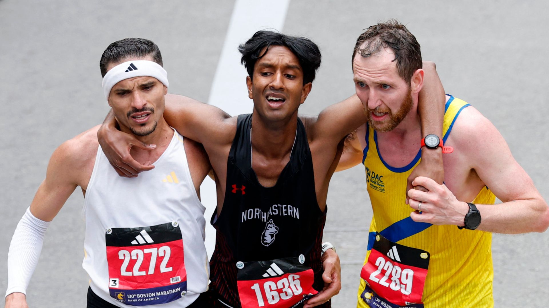 The men who sacrificed their race to help another Boston Marathon runner
