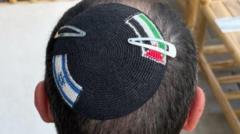 Israeli police investigate after officers ‘cut Palestinian flag’ from skullcap