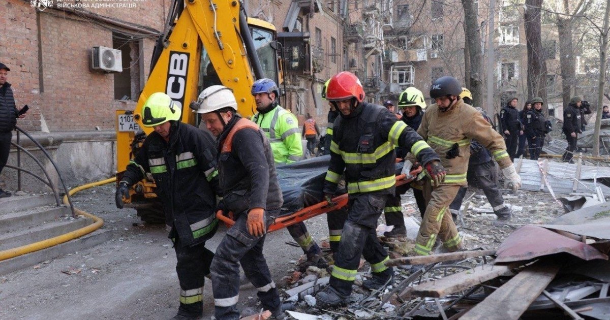 Russian attacks on Ukraine kill at least five, damage ship in port