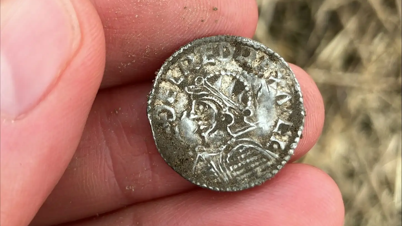 ‘The detectors never stopped beeping!’ Nearly 3,000 coins discovered in field are Norway’s largest Viking hoard on record