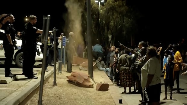Protesters clash with police in Australia after suspected killer of Indigenous girl arrested