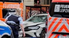 Two killed and many injured after car driven into crowd in German city of Leipzig