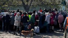 To stay or risk the ‘Road of Death’ – Ukrainian civilians trapped in frontline city