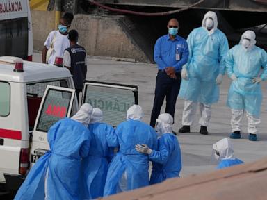The Latest: 3 passengers from virus-hit cruise ship evacuated to the Netherlands
