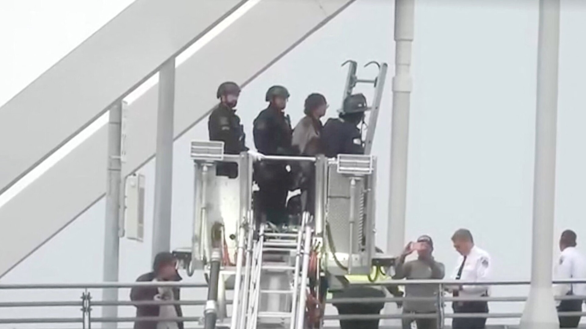 Police arrest protester after five-days atop Washington bridge