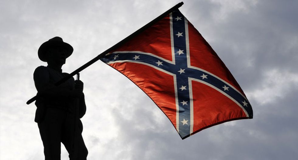 Lawmaker sets Confederate flag ablaze over red state’s redistricting push