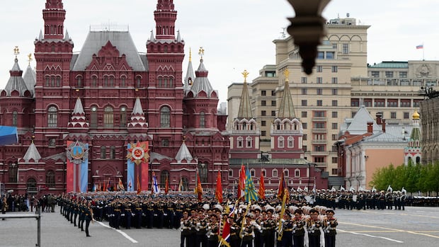Putin oversees scaled-back WW II Victory Day parade amid temporary Moscow-Kyiv ceasefire