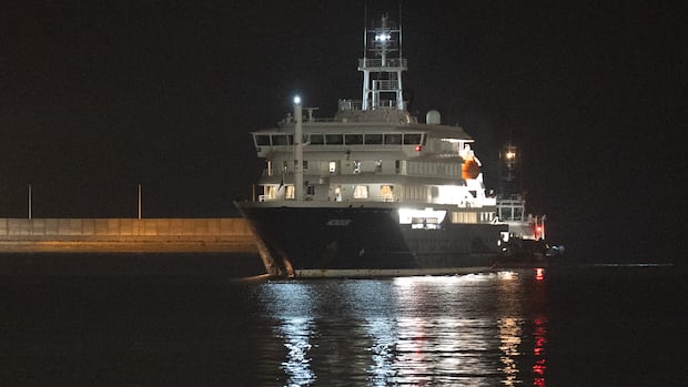 Cruise ship dealing with hantavirus outbreak arrives at port in Spain’s Canary Islands