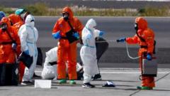 Countries airlift nationals evacuated from virus-hit cruise ship
