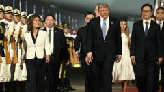 Trade, Iran and Taiwan on the agenda as Trump arrives in China for high-stakes talks with Xi