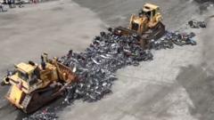 Hundreds of illegal motorbikes bulldozed in New York City crime crackdown