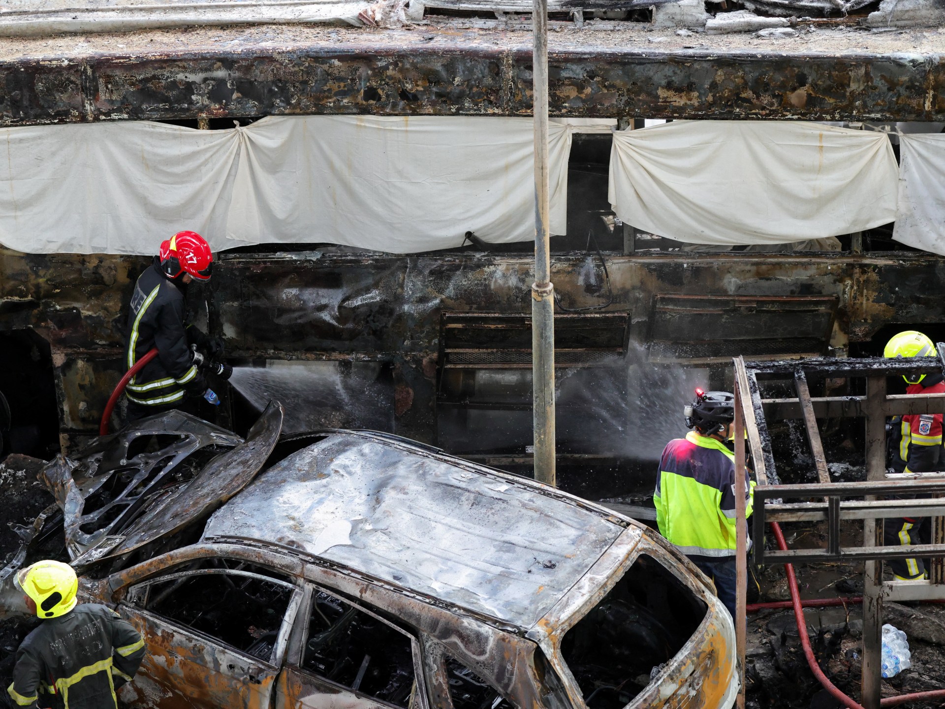At least eight killed, 25 injured as train hits bus in Bangkok