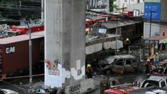 Freight train and bus crash kills at least eight in Bangkok
