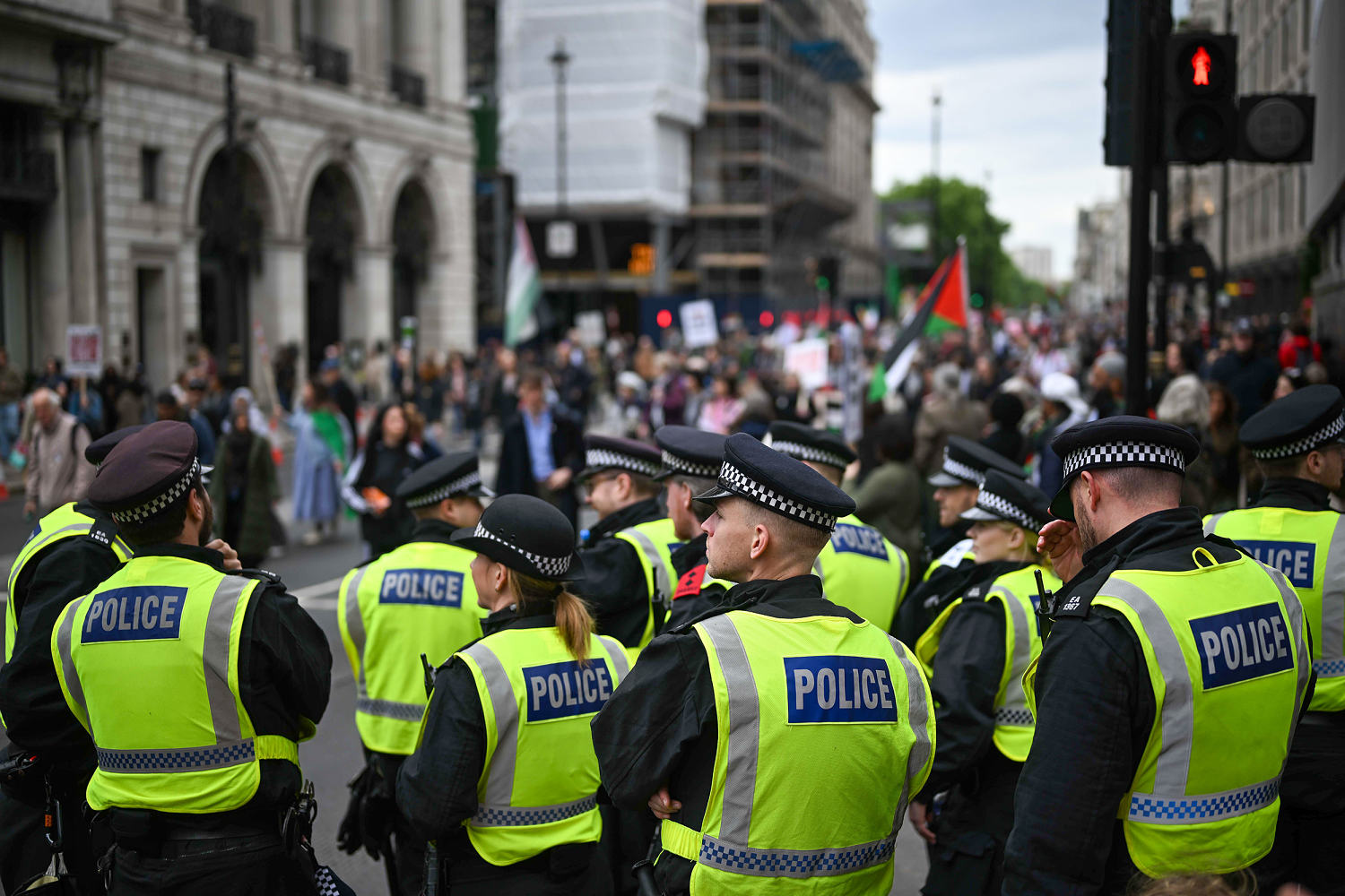 London police out in force to deal with rival rallies and a soccer final