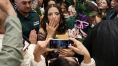 Eurovision winner Dara arrives to screaming fans in Bulgaria