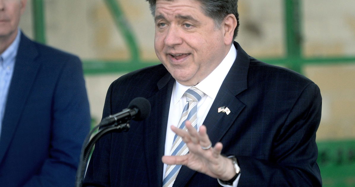 JB Pritzker laughs along with commenter who mocked his 1993 Pride parade outfit